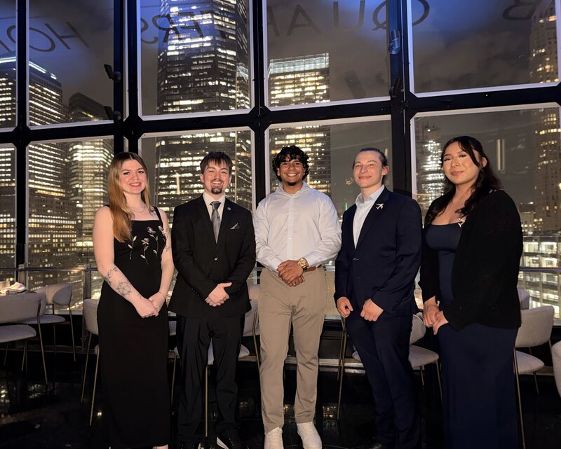 Frostline Foundations team members celebrating together at a company event
